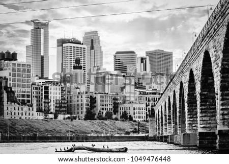 Black and White Minneapolis Skyline with Walking Bridge and Mississippi River