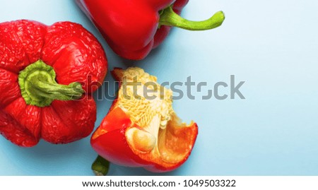 Fresh Red bell pepper, close-up object, macro photography. Food creative concept. Top view Blue Background Flat Lay with copy space