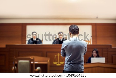 back of attastor talking to magistrate in court. the law adjustment concept Royalty-Free Stock Photo #1049504825