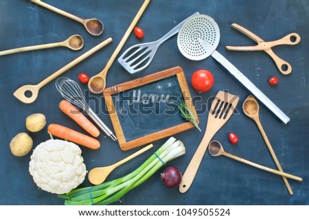 Food ingredients, kitchen utensils,black board for menu, flat lay, copy space