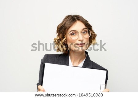 business woman in glasses with a folder                               