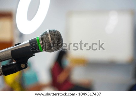 Close up and focus on Microphone in the make up class., blur background.