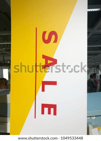 Sale sign banner with shopping mall background
