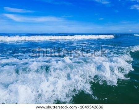 Waves in blue sea