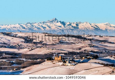 Grinzane Cavour castle and mountains in northern italy, langhe region, piedmont