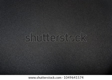 Teflon non-stick frying pan close-up. Kitchen. Black abstract background. Cooking food concept. Royalty-Free Stock Photo #1049641574