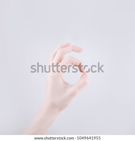 Gesture of the hand. Gesture is OK. Bunny out of hand. Studio photography. Isolated object. Creative photo
