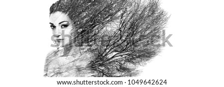 Double exposure portrait of attractive woman combined with photograph of tree or branches, surreal portrait of a young girl with multiple exposure effect, black and white photography