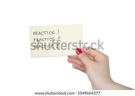 Closeup on business woman holding a card with text PRACTICE, PRACTICE, PRACTICE, business concept image with soft focus background