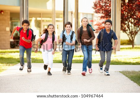 Schoolchildren at home time Royalty-Free Stock Photo #104967464