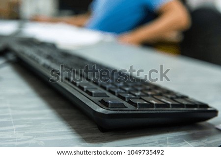 Closeup on keyboard in office.