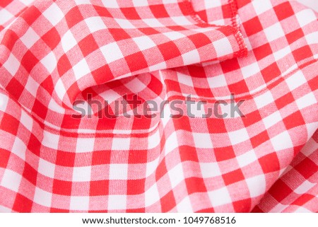 Tablecloth red in a cage