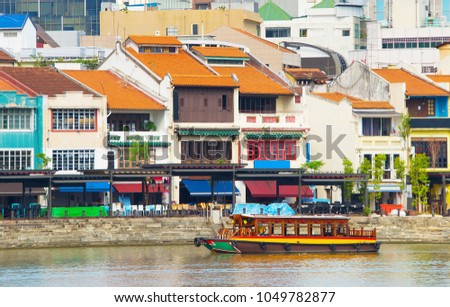 View of famous Boat Quay - historical city part of Singapore Royalty-Free Stock Photo #1049782877