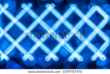 Abstract color neon or led lights background with bokeh effect