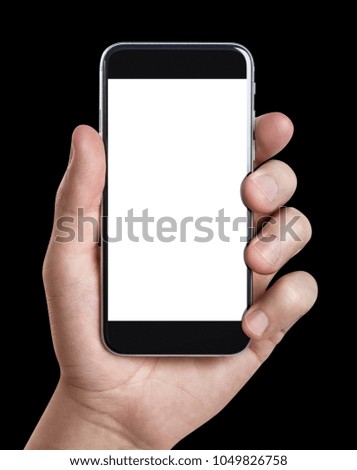 Hand holding black smartphone, isolated on black background