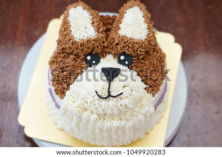 A dog Birthday cakes with afternoon tea set on white background