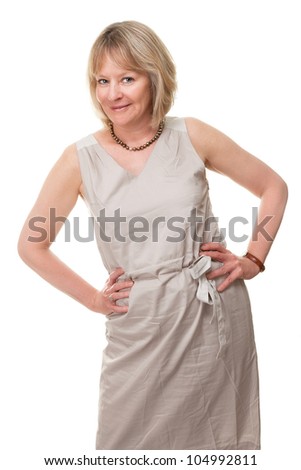 Portrait of Happy Attractive Mature Woman with Hands on Hips Isolated