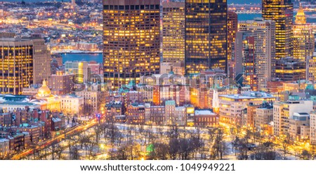 Aerial view of Boston skyline and Boston Common park in Massachusetts, USA at sunset in winter