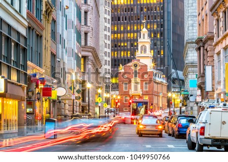 Old State House and the skyscrapers of the Financial District at twilight in Boston, Massachusetts, USA