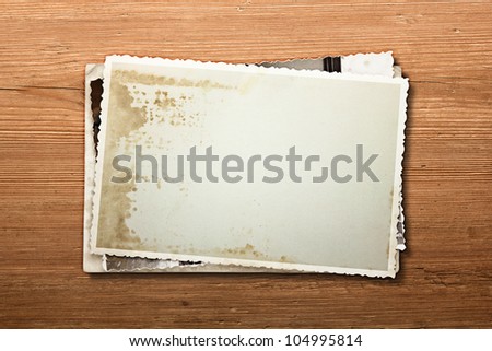old photos on a wooden background
