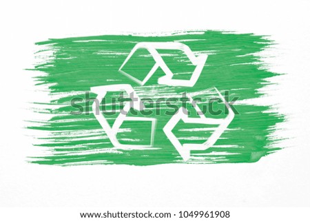 Art brush watercolor painting of white Recycle logo symbol or recycling arrows on green flag blown in the wind isolated on white background.