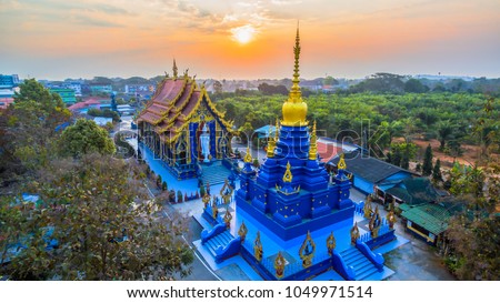 Chiang Rai Blue Temple or Wat Rong Seua Ten is located in Rong Suea Ten in the district of Rimkok a few kilometers outside Chiang Rai Royalty-Free Stock Photo #1049971514
