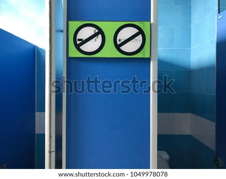 No smoking signs, Do not scratch the wall signs, Signs in the bathroom