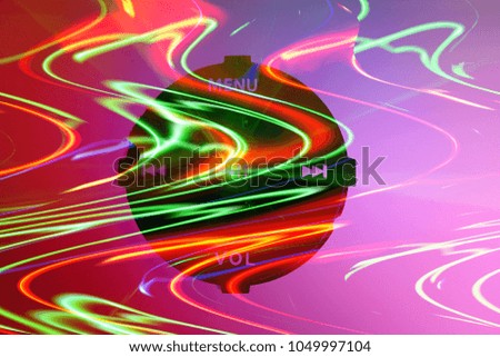 An abstract image of musical controls in colorful waving dance lights