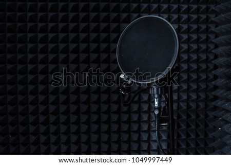 Microphone at the sound recording studio room
