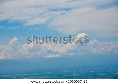 Beautiful clear sky with fluffy cloud background.