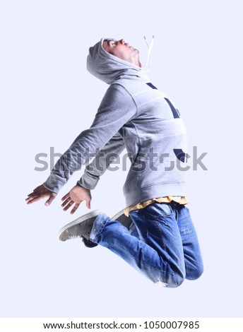 modern guy is dancing breakdance.