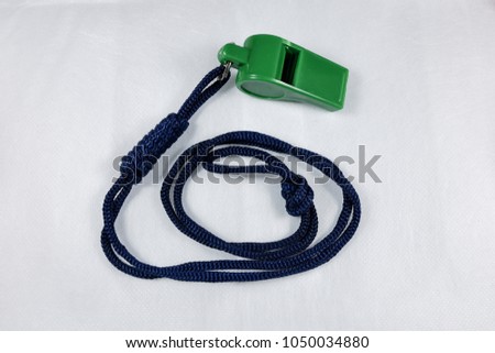 Whistle for judging in a sporting event on a white background.