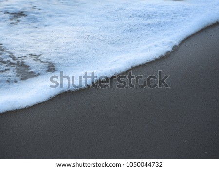 Sea waves and sand on the Thailand beach