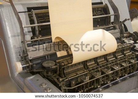 Brass numerals from Babbage's analytical engine. Ancient old computer. Royalty-Free Stock Photo #1050074537