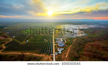 Aerial photo of solar photovoltaic panels at sunrise