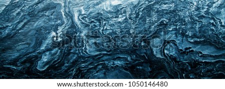 marble, blue texture of natural stones, relief of the planet Royalty-Free Stock Photo #1050146480