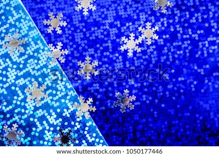 dark and light  blue holographic background texture with snowflakes