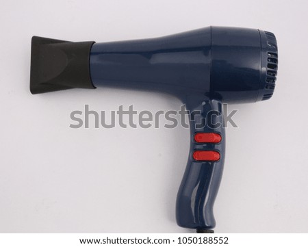 Hair dryer with white backdrop.