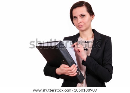 The girl the brunette looks directly forward, holds the folder with documents before herself and is going to write in her with a pen, on the isolated white background. A portrait on a belt