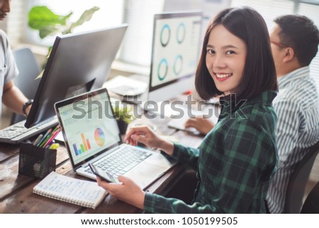business woman meeting with colleagues in the office Royalty-Free Stock Photo #1050199505