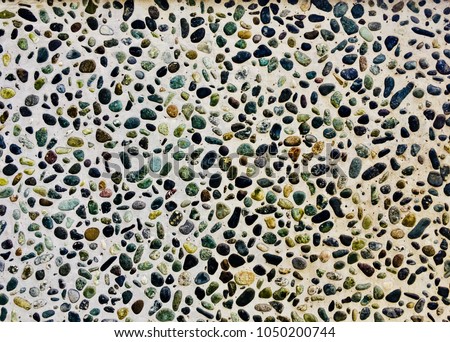 Colorful Gravel wall background.