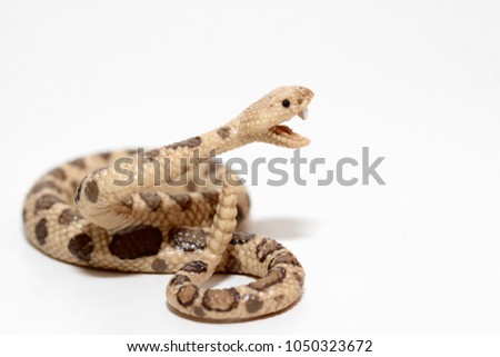 miniature figurine of a rattlesnake