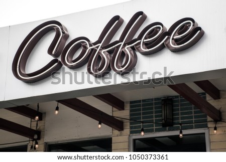 Coffee shop modern and stylish sign displaying local made coffee in text
