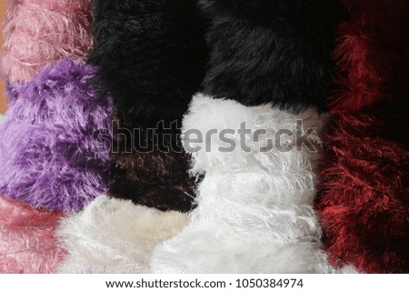 color grades, yarns in various qualities and characteristics in rainbow colors. background