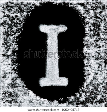 English capital letter 'I' printed white ink stamp isolated on black background