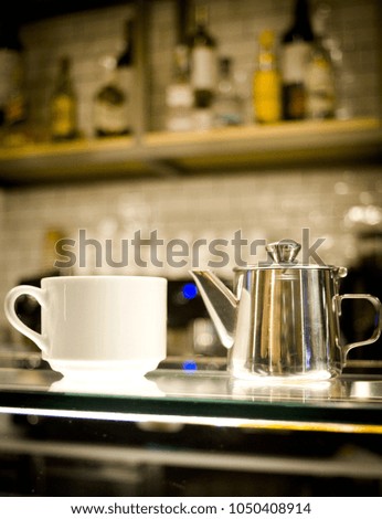 Whhite coffee cups on glass counter