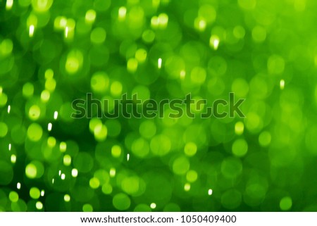 Dark green bokeh abstract of blurry lights background