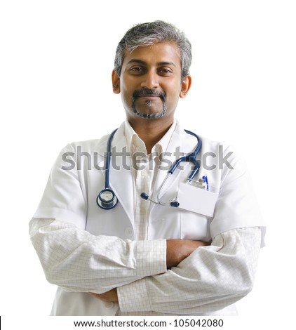 Indian mature male doctor crossed arms on white background Royalty-Free Stock Photo #105042080