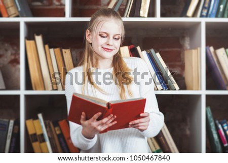 Teenage girl in a library