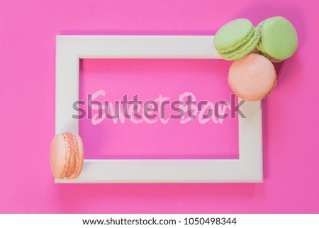 Sweet Bar Card: pink and green macarons on a pink frame on a pink background  punchy pastels
